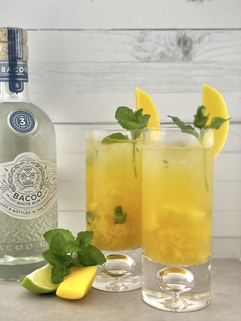 Bottle of BACOO Rum 3-Year White and 2 Mango Mojito drinks
